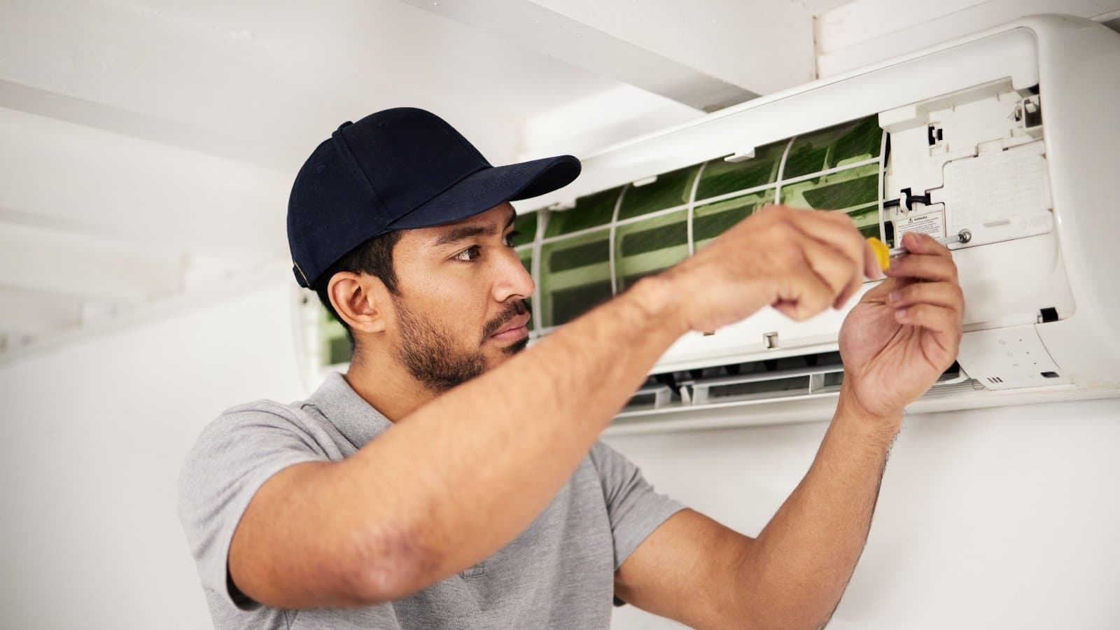 technician-fixing-ductless-mini-split