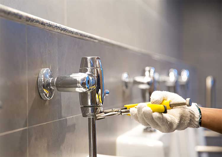 ada-compliant-toilets - Commercial Plumbing Fixture installation